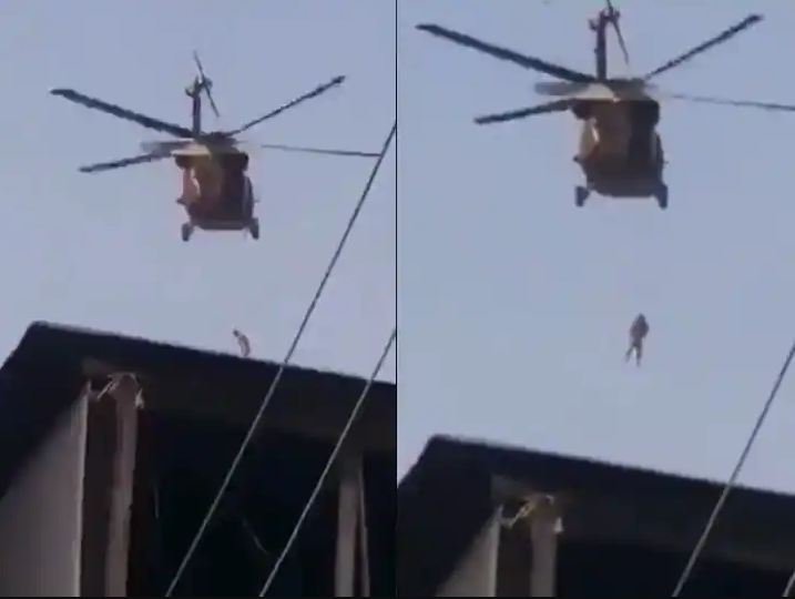 US Exit From Afghanistan Taliban Fly American Black Hawk Helicopter With Hanging Body