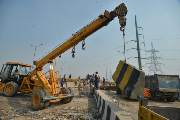 Removal of Police barricading at Tikri border underway