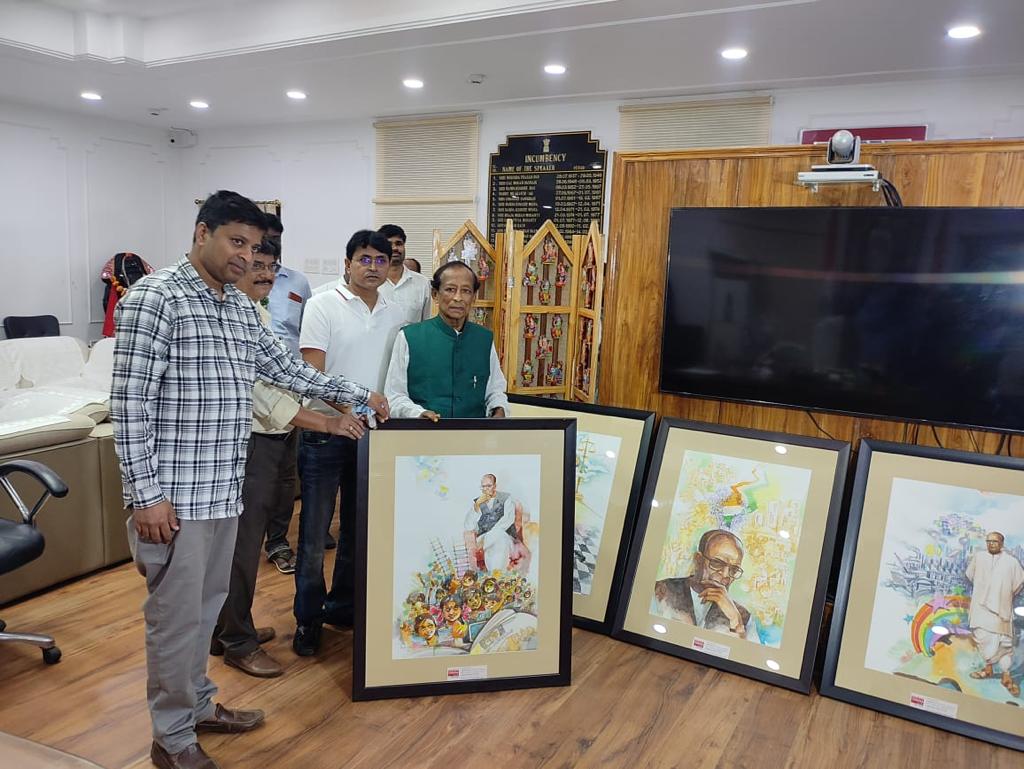 Odisha Live Gives Oil Printed Photo Of Biju Babu To Odisha Assembly